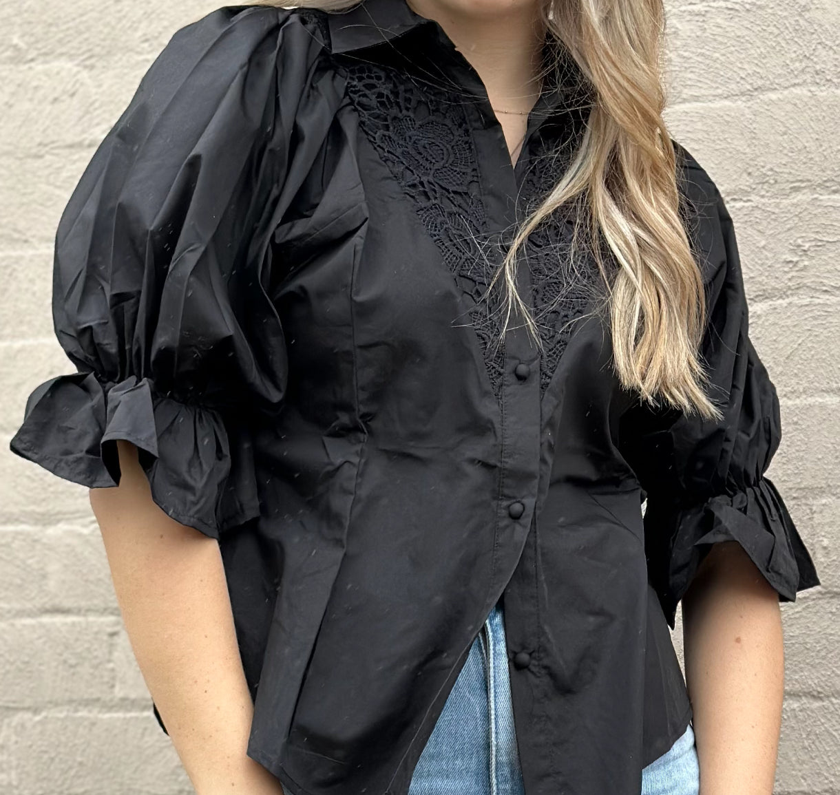 White sandstorm black blouse