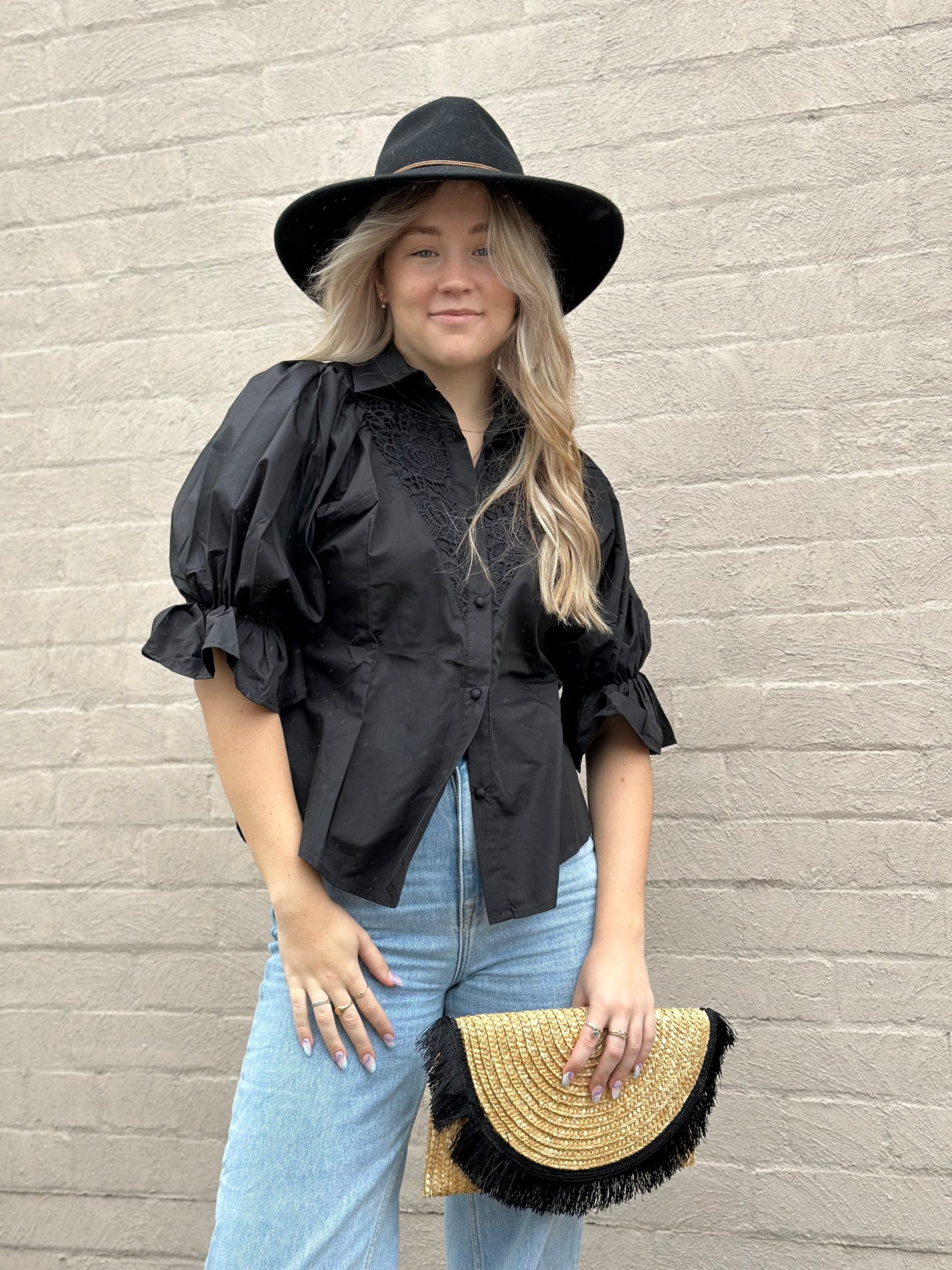 White sandstorm black blouse