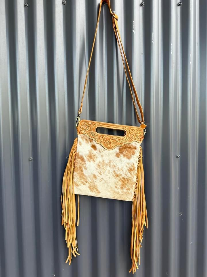 Cowhide tooling leather sling bag